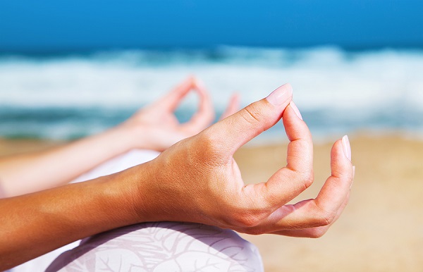 Yoga meditation on the beach