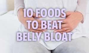woman holding belly for bloat