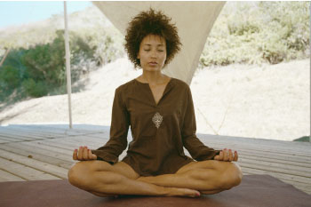 woman meditating hacks manage menopause