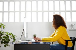 woman sitting at desk