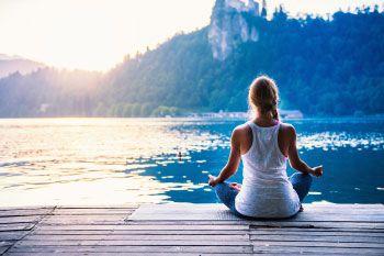 woman meditating in nature