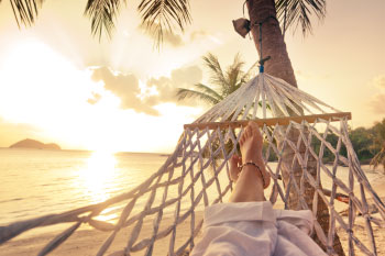 woman in a hammock on beach