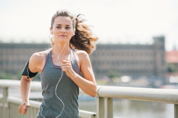 woman running on pier