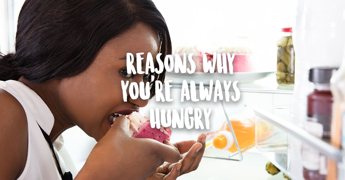 woman eating donut from the fridge