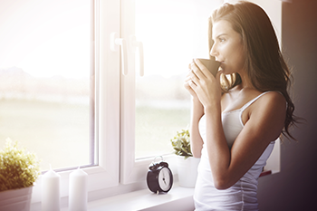 woman having a morning coffee positive mindset