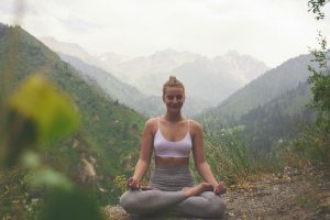 mindful meditation in nature woman meditating outside